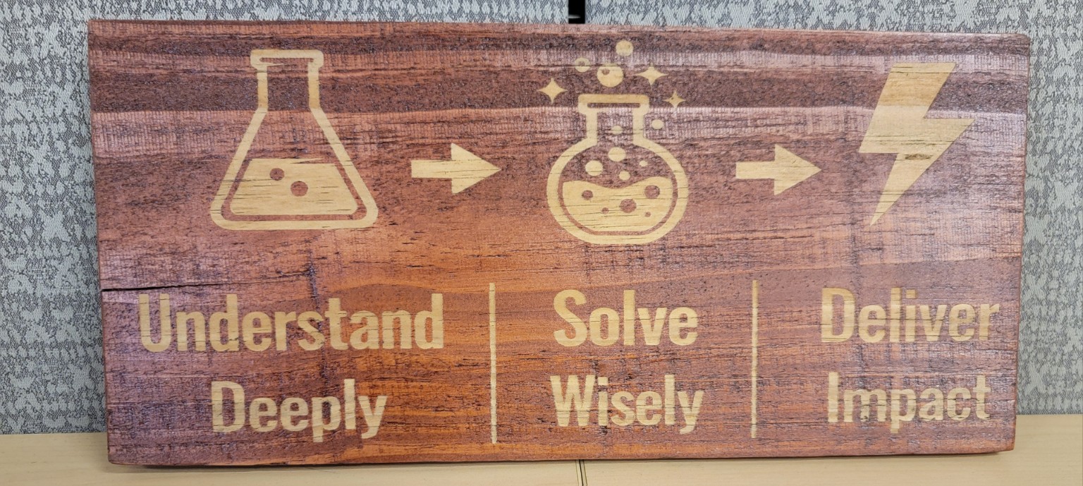 Engraved mission statement on wood